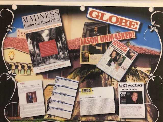 A bulletin board with various magazines and other items.